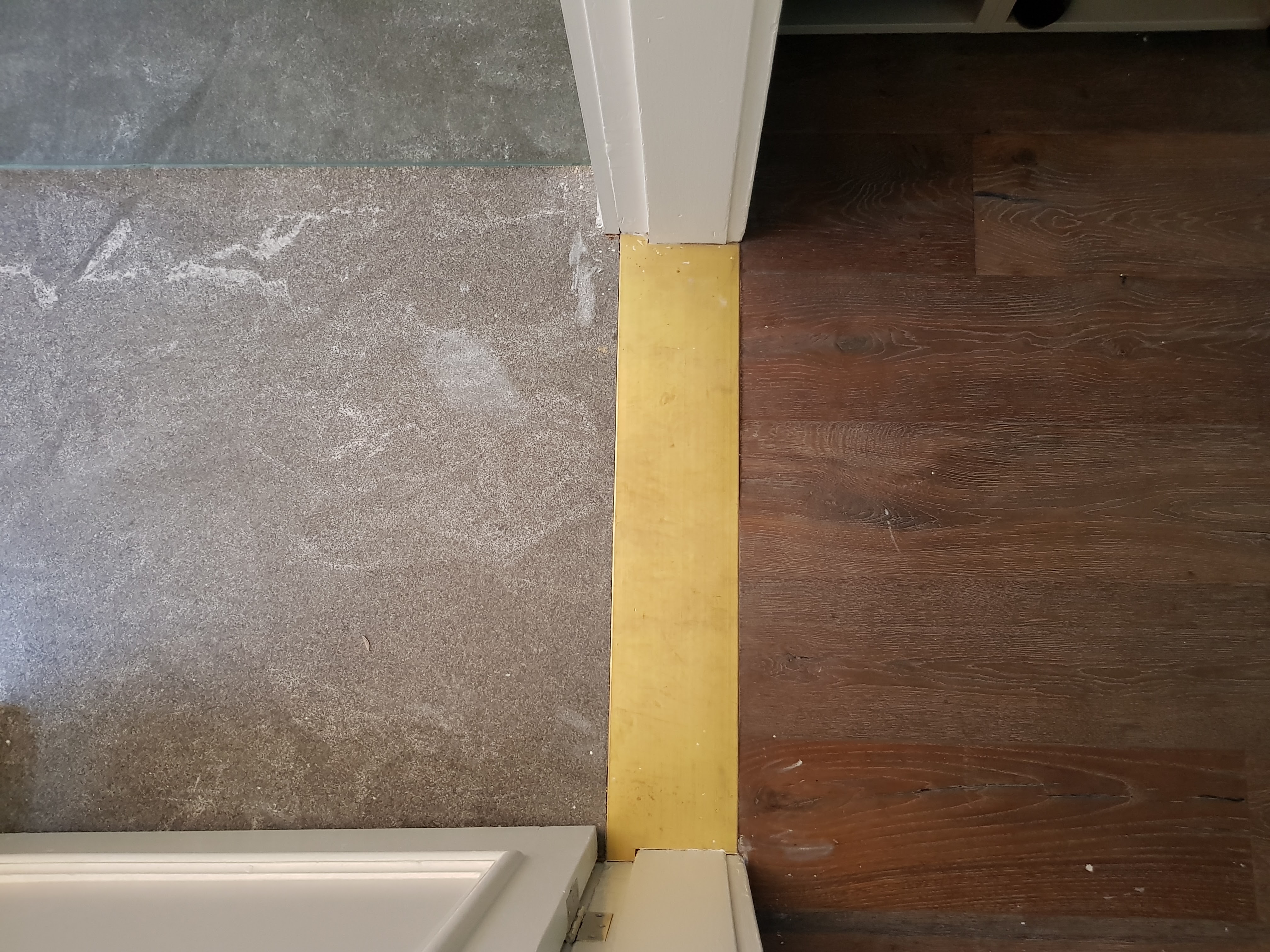 A yellow strip of paper on the floor